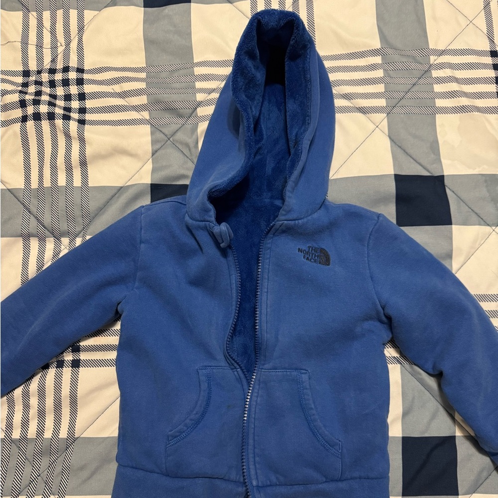 Used North Face, toddler boys blue reversible warm sweater.